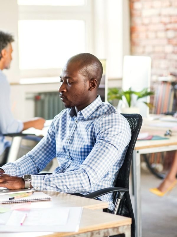 businessman-using-laptop-at-desk-in-office-with-co-2026-01-05-00-58-08-utc (1) (1)