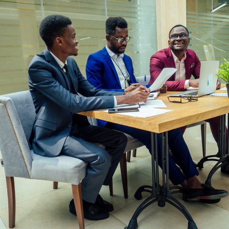 mixed-race-business-people-sitting-in-modern-offic-2026-01-05-23-14-14-utc (1) (1)