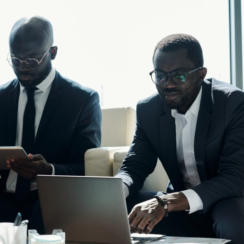 young-serious-african-american-male-coworkers-usin-2026-01-08-22-09-11-utc (1) (1) (1)